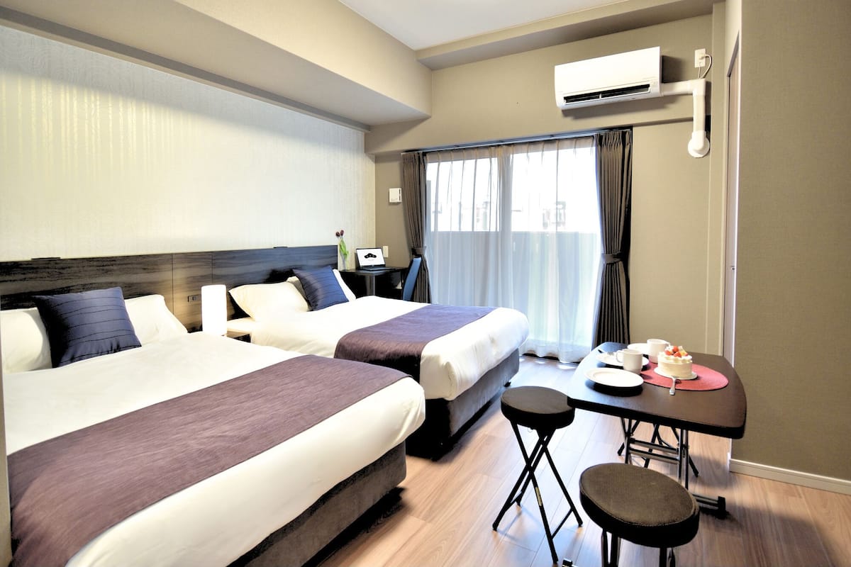 Deluxe Twin Room with Desk | Blackout drapes, WiFi (free), bed sheets
