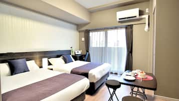 Deluxe Twin Room with Desk | 1 bedroom, blackout drapes, free WiFi, bed sheets