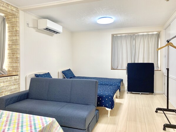 Departamento, 1 habitación | Área de sala de estar | Televisión de pantalla plana 