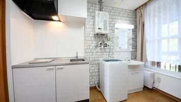 Basic Apartment, 1 Bedroom | Private kitchen | Fridge, microwave, electric kettle, cookware/dishes/utensils