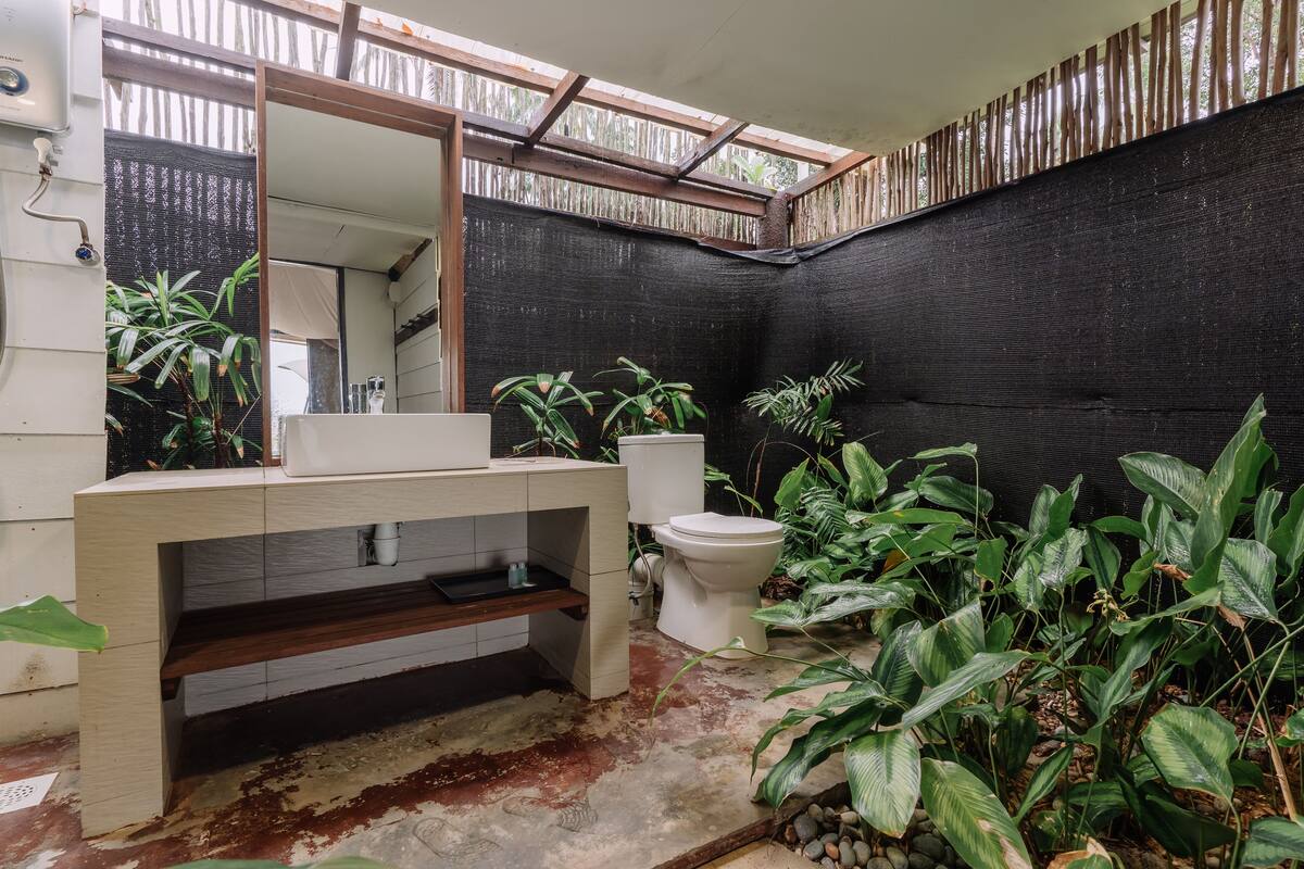 the canopi | bathroom | shower, hair dryer, slippers, towels