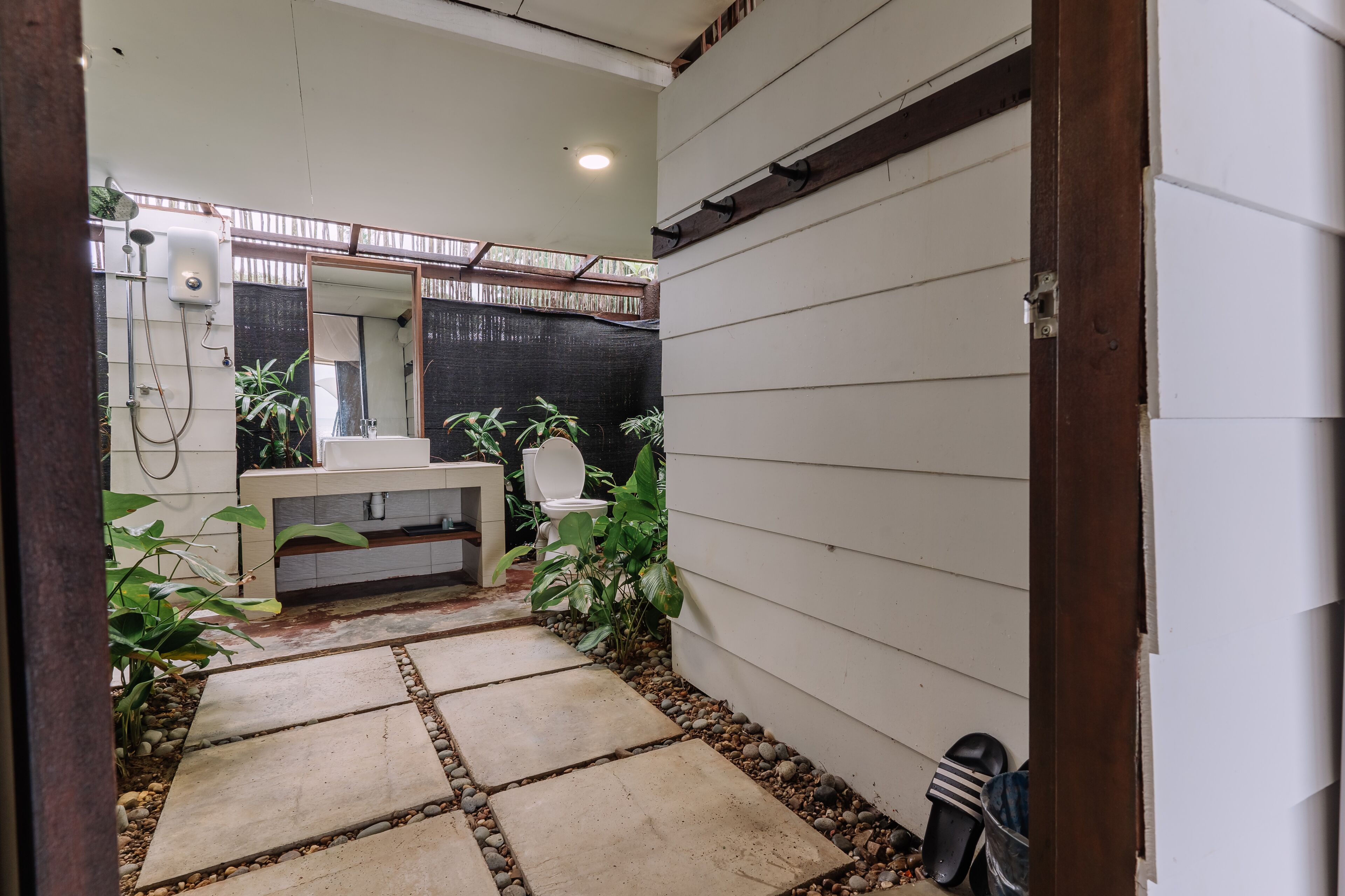 the canopi | bathroom | shower, hair dryer, slippers, towels