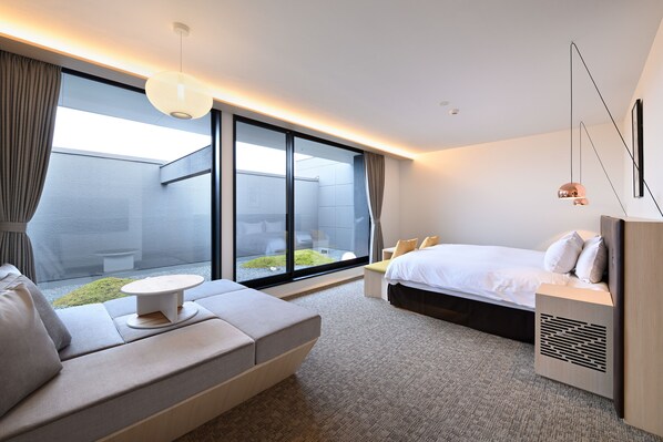 Svit - 1 kingsize-säng - utsikt mot trädgården | Terrass/Patio