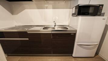 Mini-fridge, microwave, stovetop, electric kettle