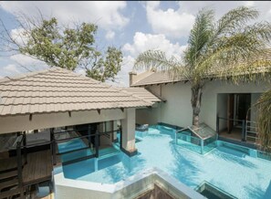 Outdoor pool, pool umbrellas, pool loungers