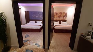 Family Room | Minibar, in-room safe, iron/ironing board, free WiFi