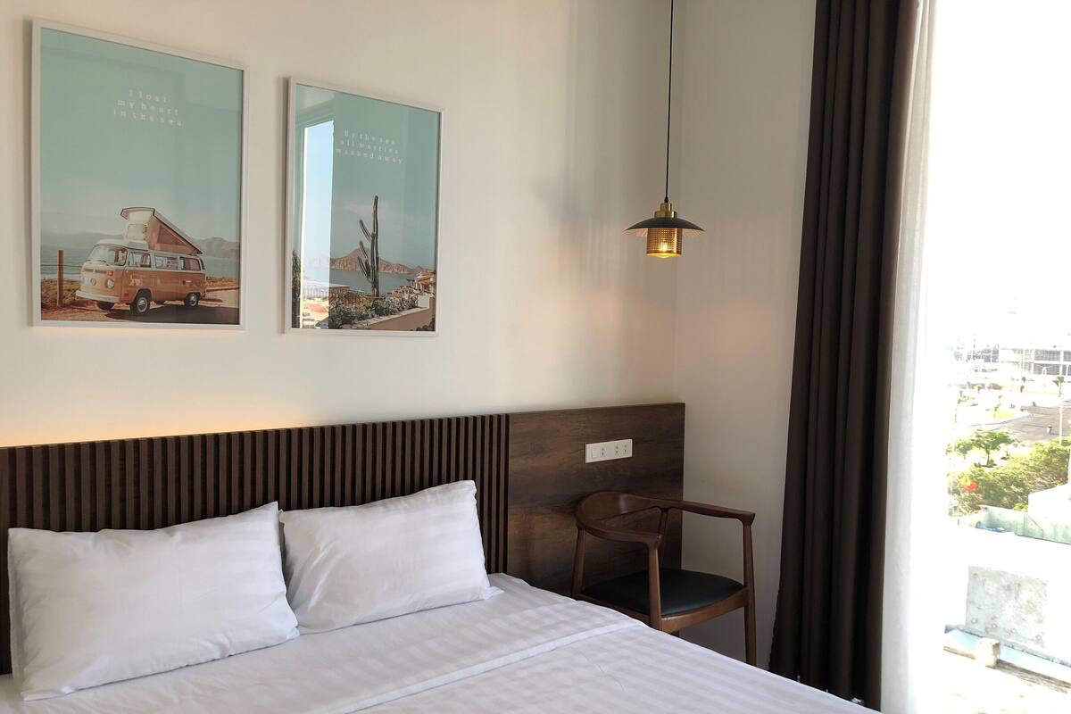 Minibar, desk, laptop workspace, iron/ironing board