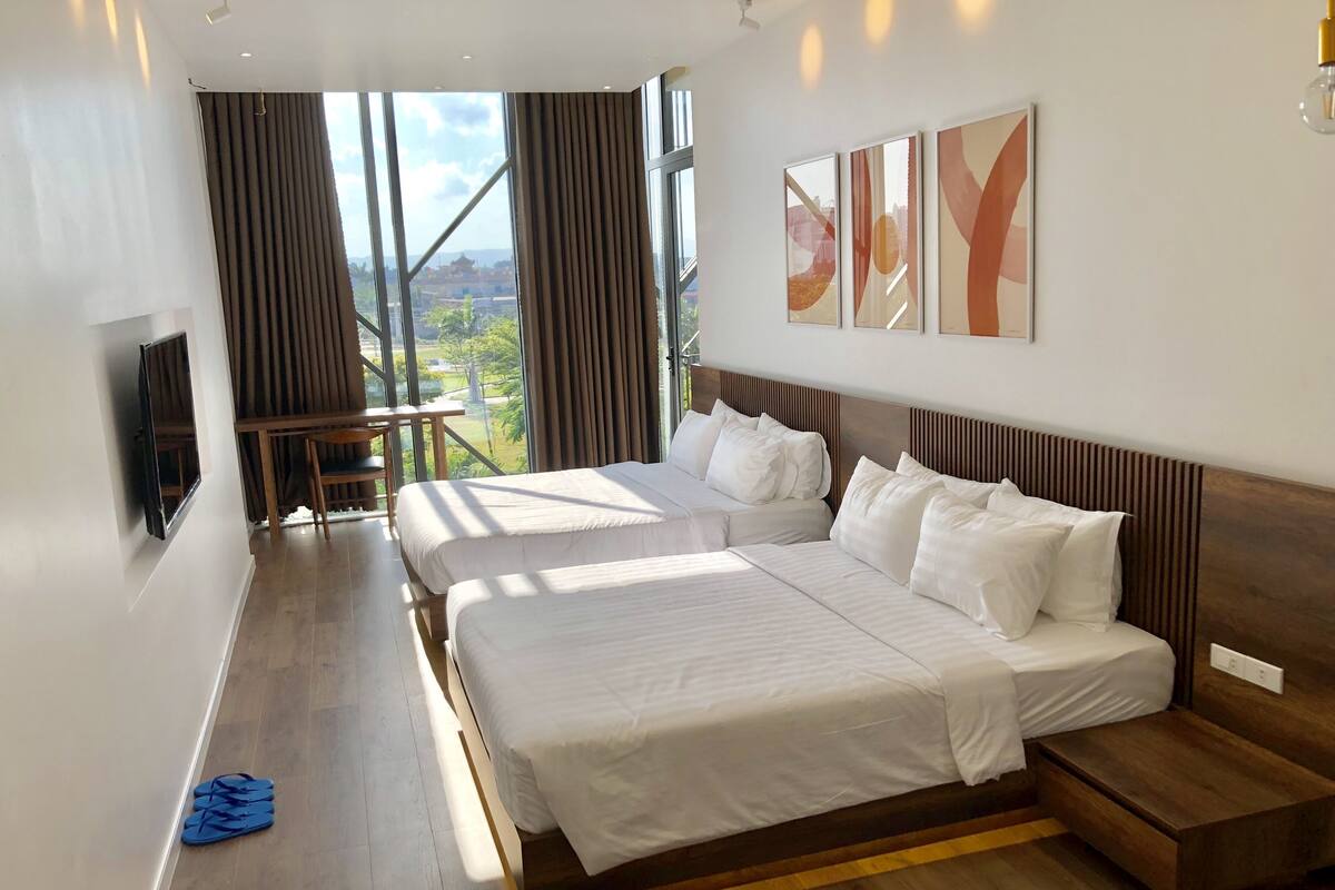 Minibar, desk, laptop workspace, iron/ironing board