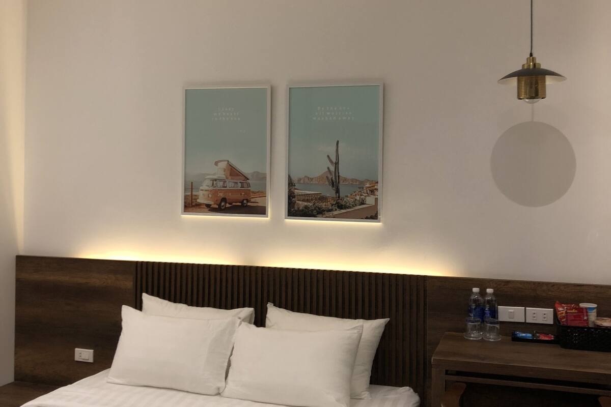 Minibar, desk, laptop workspace, iron/ironing board