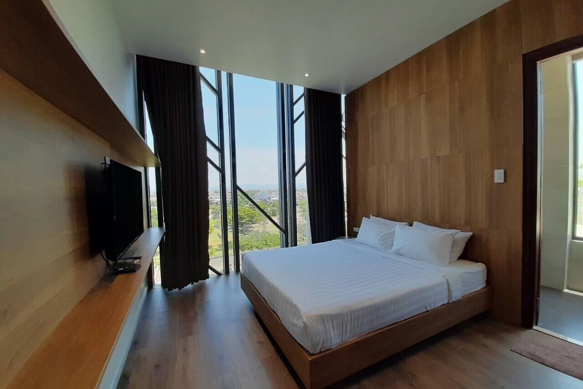 Minibar, desk, laptop workspace, iron/ironing board