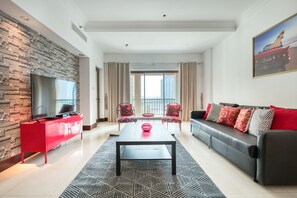 Deluxe-Apartment | Wohnzimmer | Flachbildfernseher