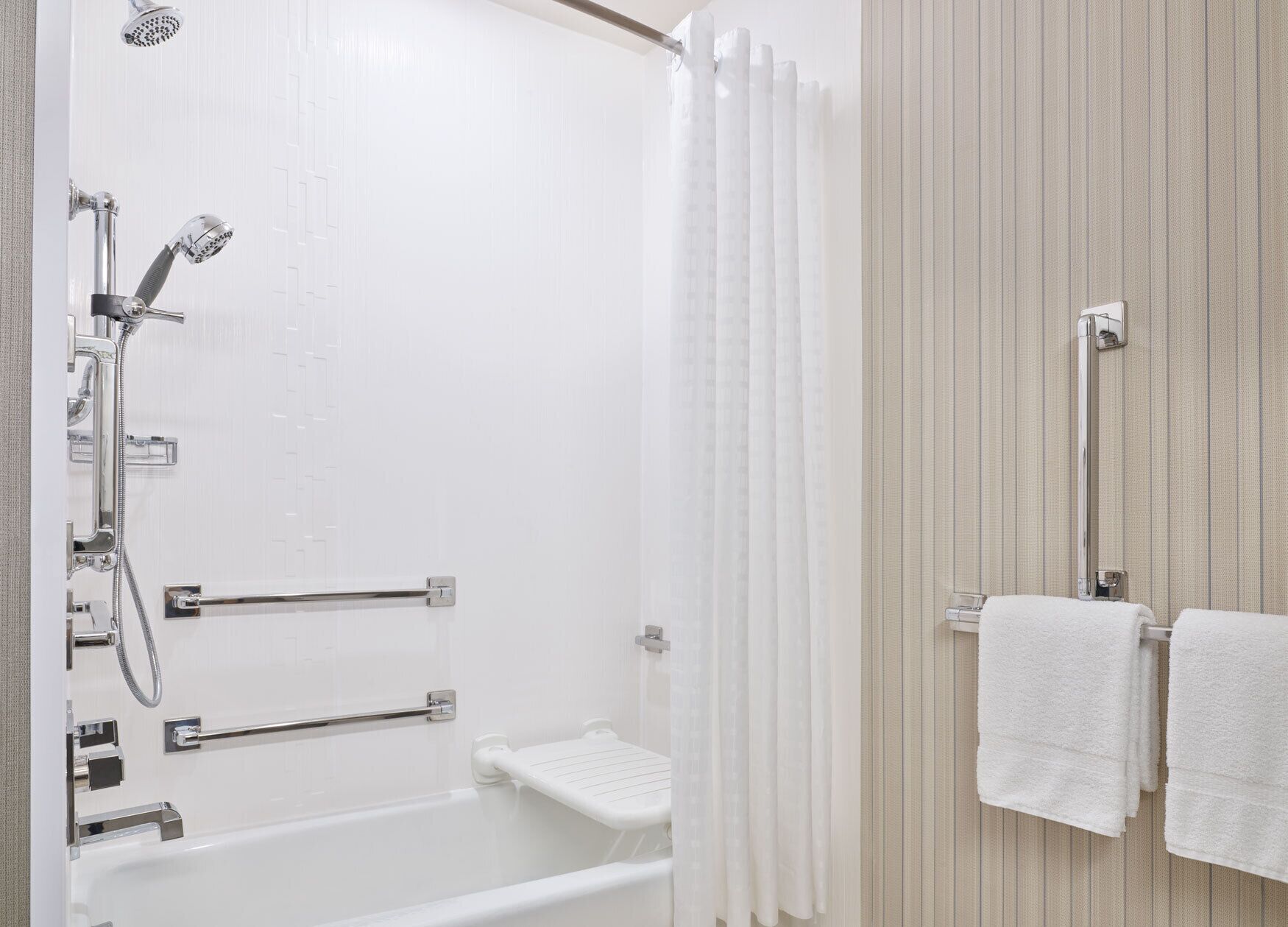 room, 1 king bed with sofa bed (mobility/hearing accessible, tub) | bathroom | rainfall showerhead, designer toiletries, hair dryer, towels