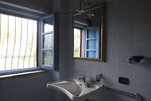 Apartment, 1 Bedroom (Maria Sole) | Bathroom | Rainfall showerhead, hair dryer, bidet, soap