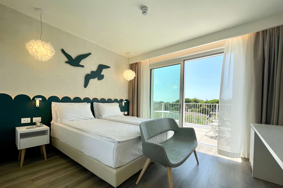 Deluxe Double Room, Partial Sea View | In-room safe, free WiFi, bed sheets