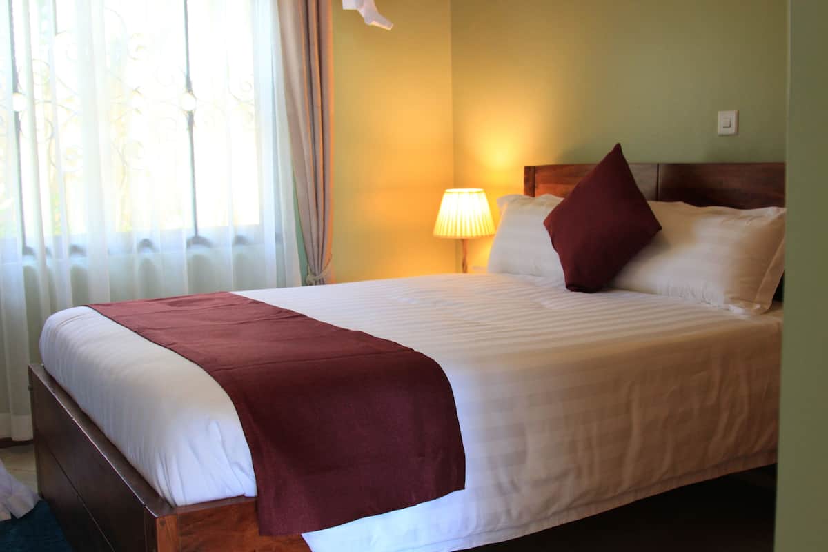 Classic Room | In-room safe, blackout curtains, iron/ironing board, free WiFi