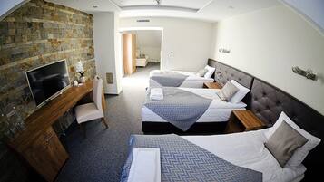 Quadruple Room, Private Bathroom | In-room safe, desk, blackout drapes, iron/ironing board