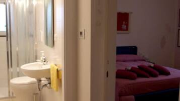 Shower, rainfall showerhead, hair dryer, towels
