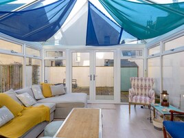 House, Multiple Beds | Living room | 30-inch TV with cable channels