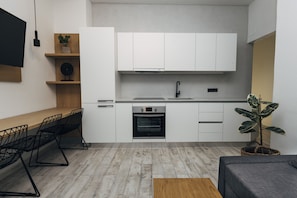 Apartamento familiar | Zona de estar | Smart TV de 43 pulgadas con canales por cable, una televisión
