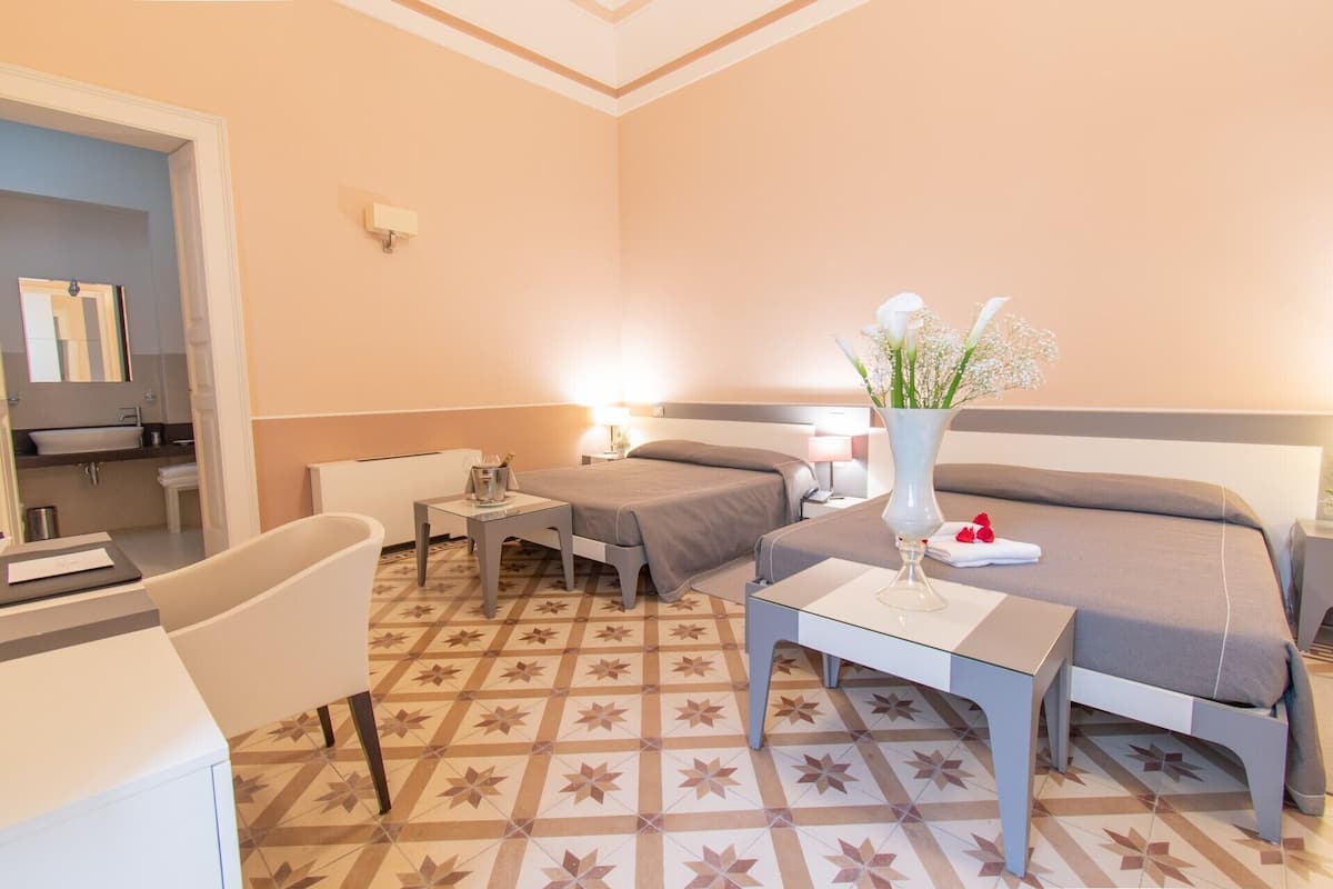 Standard Quadruple Room | 1 bedroom, minibar, in-room safe, desk