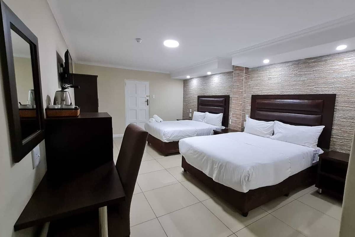 Deluxe Room | Individually furnished, desk, laptop workspace, blackout drapes