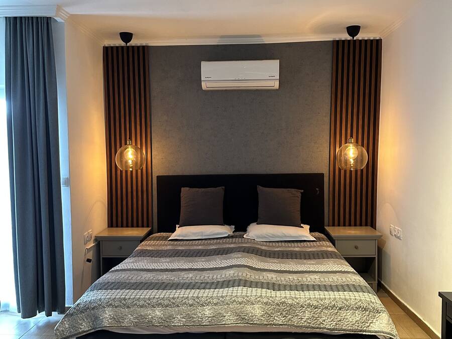 Äänieristys, silitysrauta/-lauta, ilmainen Wi-Fi, vuodevaatteet