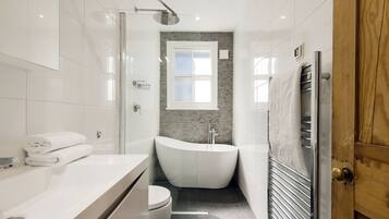 Combined shower/tub, hair dryer, towels, soap