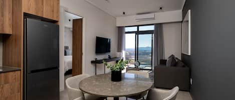 Apartment | Living area | 32-inch flat-screen TV with satellite channels, TV