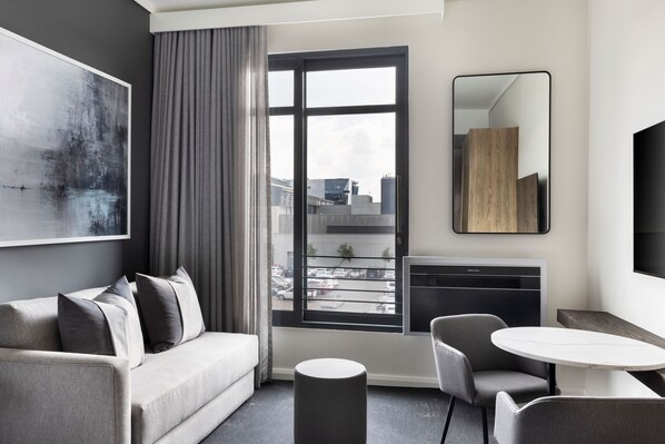 Studio | Living area | 32-inch flat-screen TV with satellite channels, TV