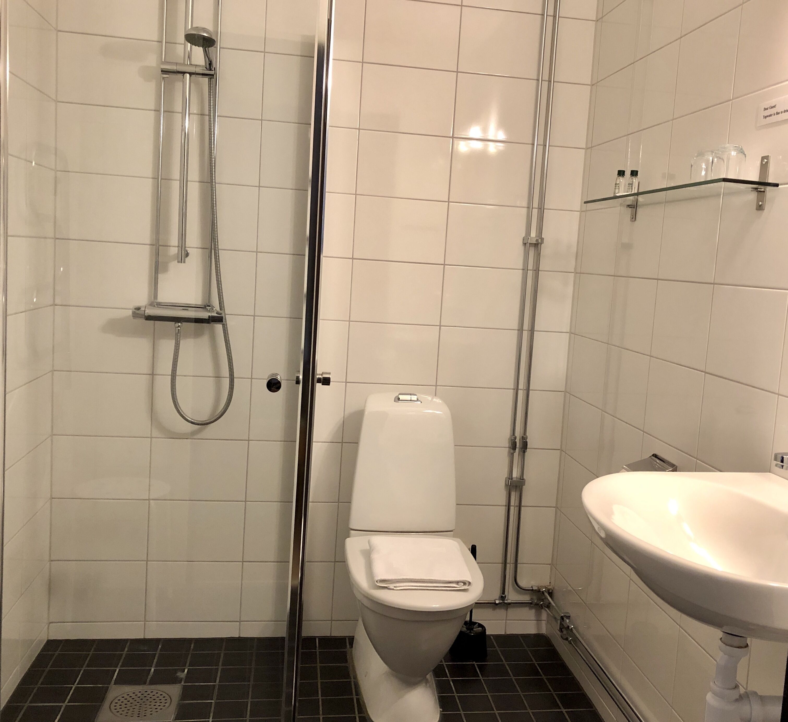 shower, hair dryer, heated floors, towels