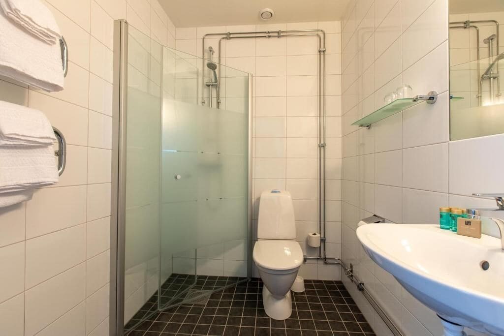 shower, hair dryer, heated floors, towels