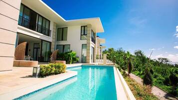 Outdoor pool, pool umbrellas, pool loungers