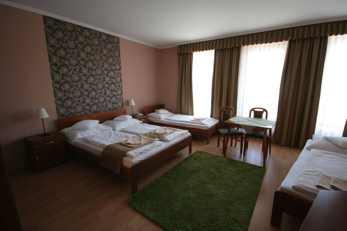 Chambre quadruple | 1 chambre, rideaux dâobscurcissement, accĂšs au Wi-Fi (inclus)