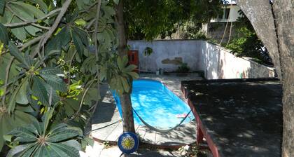 Habitacion privada en el centro, con Piscina