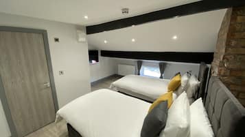 Deluxe Double or Twin Room | Individually furnished, blackout curtains, iron/ironing board, free WiFi