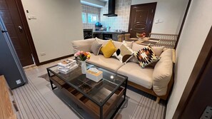 Superior Family | Living area | 32-inch Smart TV with cable channels