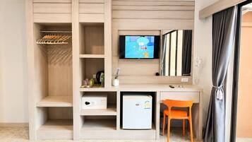 In-room safe, desk, laptop workspace, bed sheets