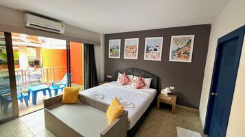 In-room safe, desk, laptop workspace, bed sheets