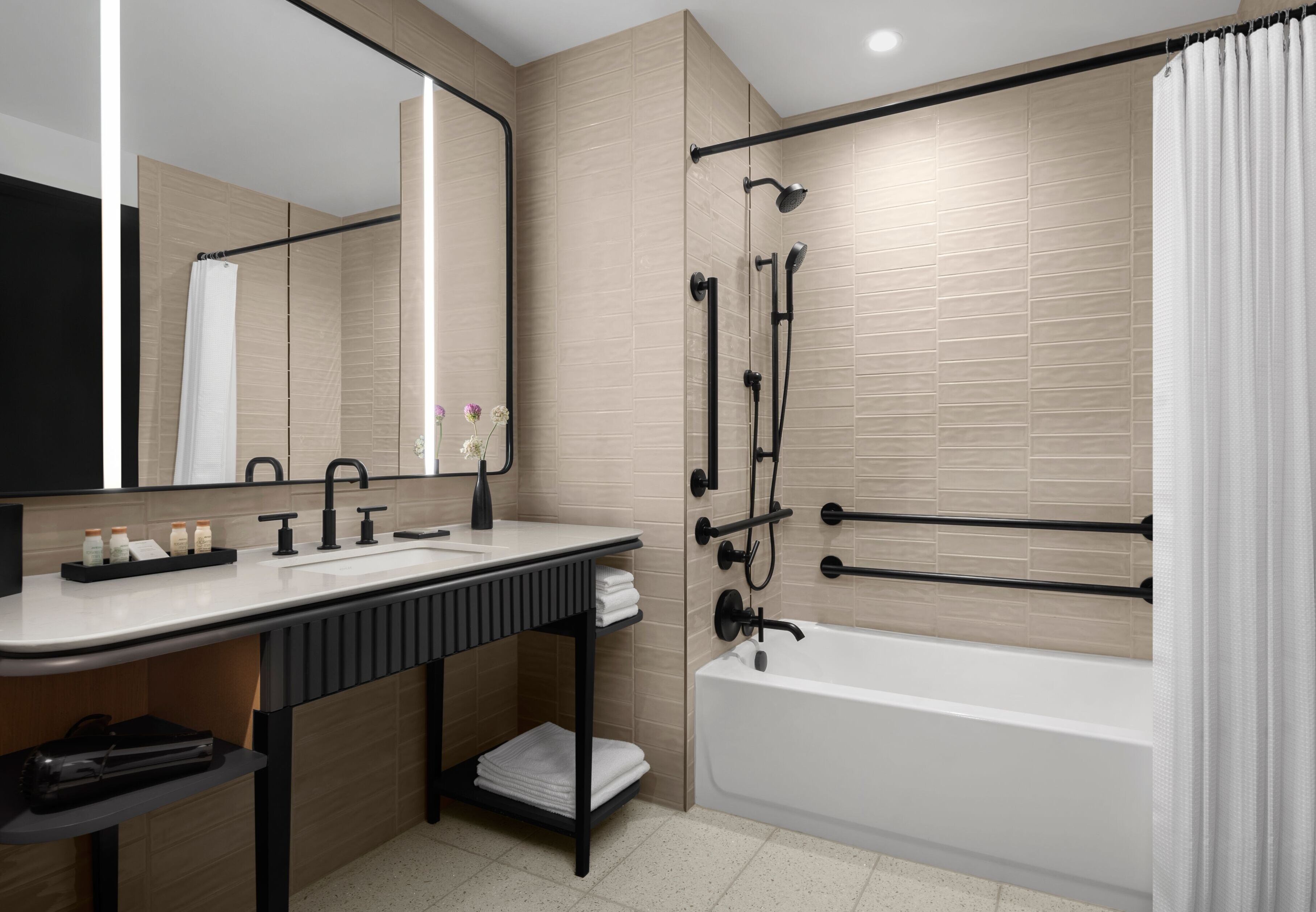 designer toiletries, hair dryer, bathrobes, slippers