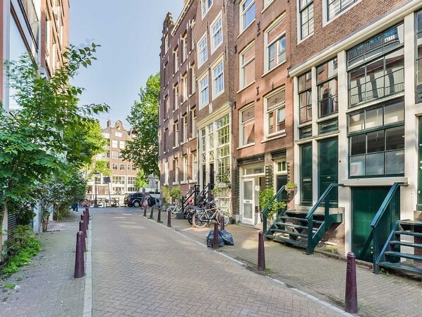 Economy Double Room, 1 Queen Bed, Non Smoking, Canal View | Street view
