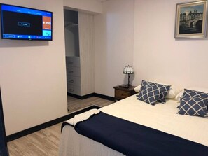1 dormitorio, tabla de planchar con plancha, wifi gratis y ropa de cama