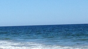 A clear view of the ocean with a calm sea and a clear sky. - Walking distance to East Hampton village  (East Hampton)
