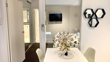 1 bedroom, desk, iron/ironing board, travel cot