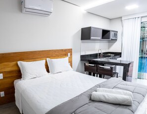 Suite, Kitchen, Pool View | Premium bedding, minibar, blackout curtains, soundproofing - Escarpas Eco Village (Capitólio)
