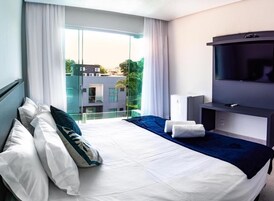 Ropa de cama de alta calidad, minibar y cortinas blackout 