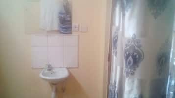Quarto casal | Pia do banheiro