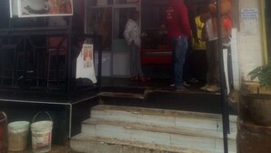 A bar and restaurant with a signboard advertising its services. - Desai Annex Guest House (Nairobi)