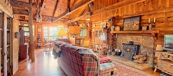 Mountaintop log cabin w/ wood stove hot tub and grill near Lake Chatuge