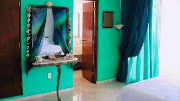 Quadruple Room, 2 Queen Beds, Balcony | Iron/ironing board, free WiFi, bed sheets