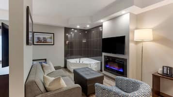 Suite, 1 King Bed, Non Smoking, Jetted Tub | Egyptian cotton sheets, premium bedding, pillow-top beds, in-room safe